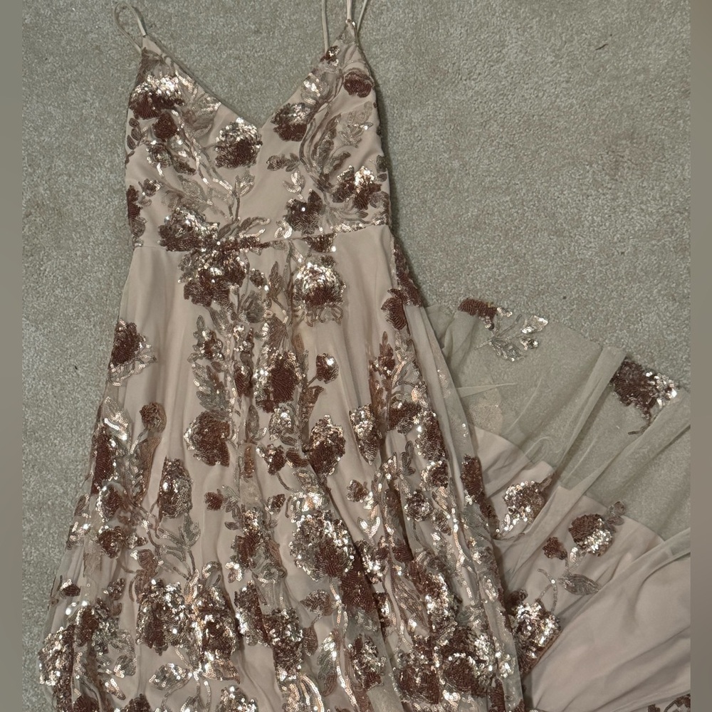 Nude formal dress with copper lace detailing
